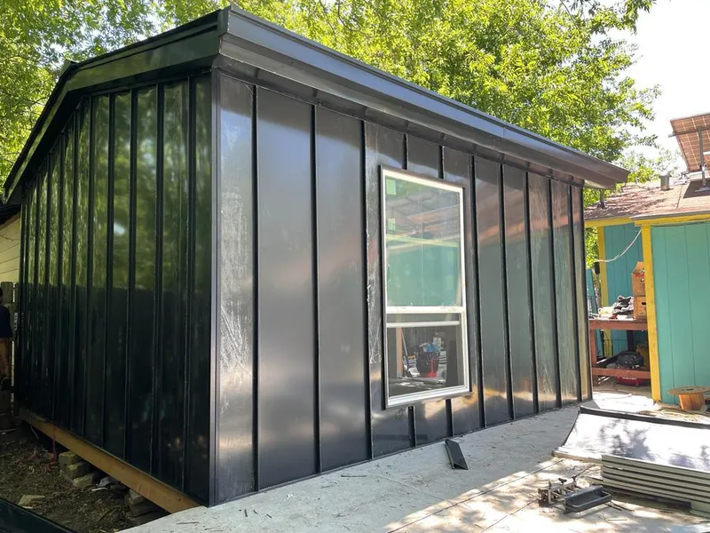 Black standing seam metal wall panels for Roof Inspection in Fort Pierce